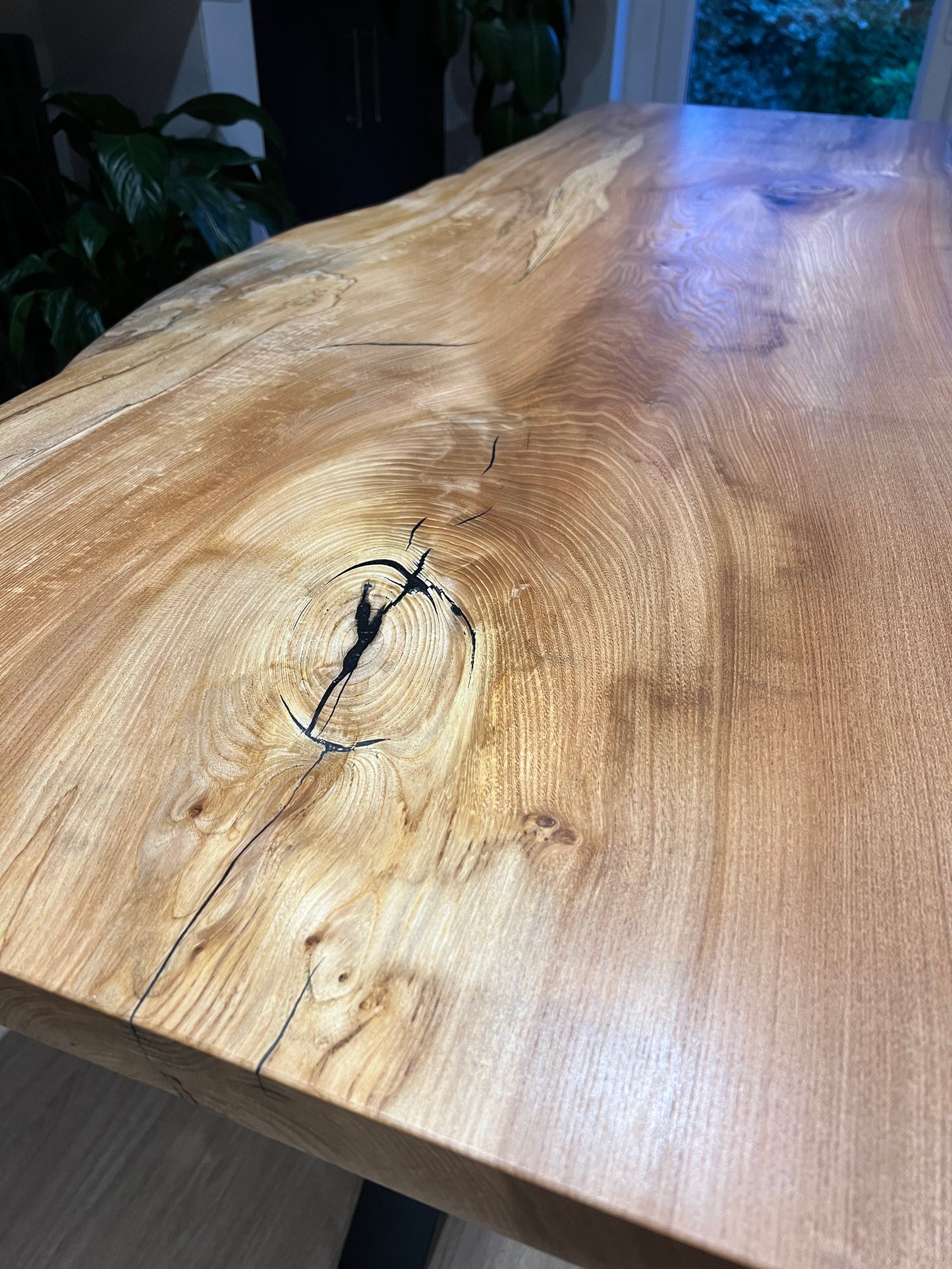 Close-up of a wooden surface with visible grain and texture